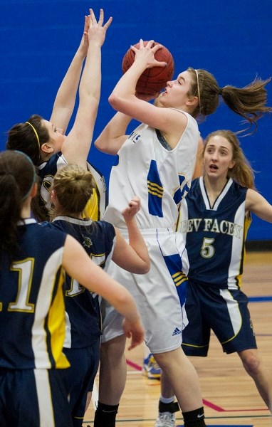OFFENSIVELY DRIVEN &#8211; Marinya Marcichiw of the St. Albert Skyhawks challenges the Bev Facey Falcons in Wednesday&#8217;s semifinal at the SkyDome. The 2012 metro