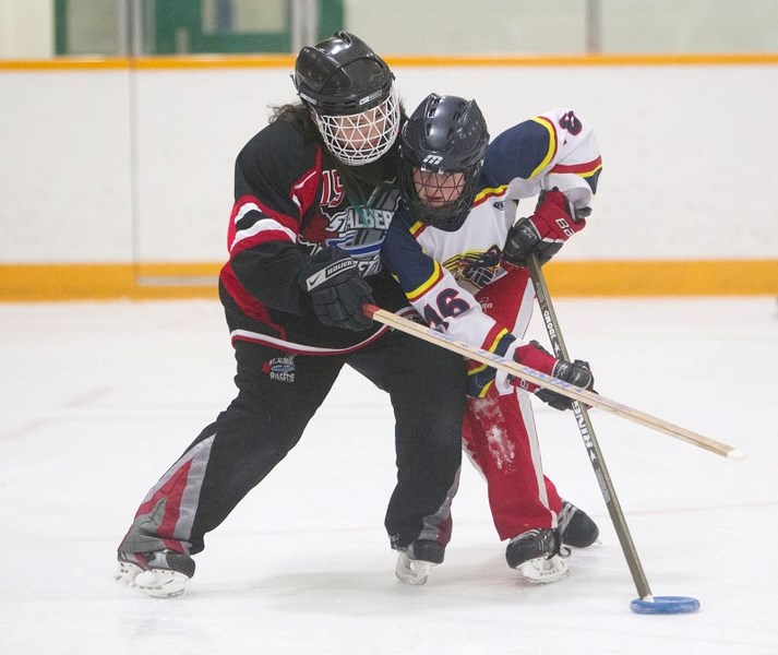 JUNIOR A PROVINCIALS &#8211; Jessica Kwiatkowski of the St. Albert Synergy battles for the ring against a Calgary Bowview Cito opponent at the U16 junior A provincial