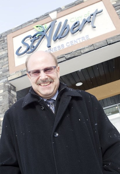 MOVING ON – Business and economic development manager Bruce Randall is all smiles as he&#8217;s set to retire from the City of St. Albert after more than three decades on the 