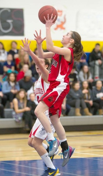 SAPEC FINAL &#8211; Serena Lillo of the Sir George Simpson Voyageurs goes up for a layup against Maria Cain of the Vincent J. Maloney Marauders in the SAPEC Tier 1 city final 