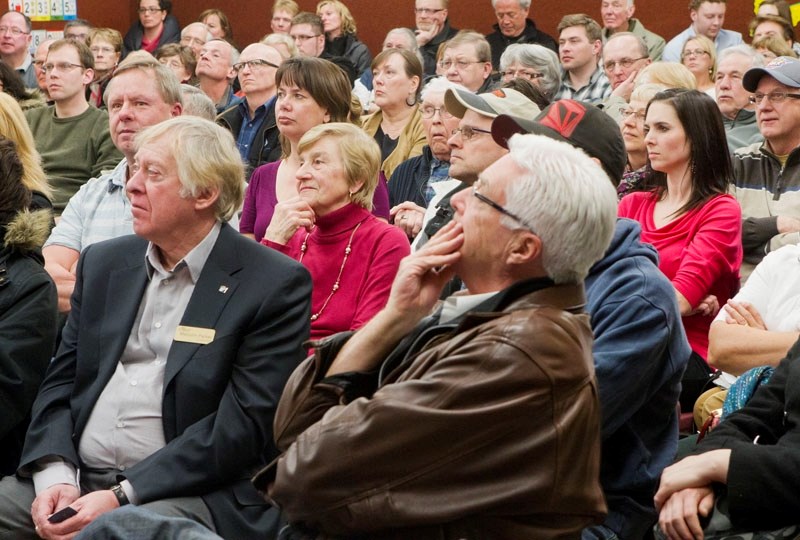 CONCERNED RESIDENTS – It was shoulder to shoulder at an open house meeting Thursday evening when residents of Lacombe Park expressed their opposition to a proposed mountain