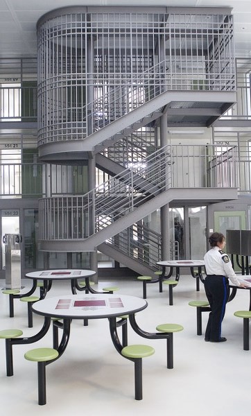 A secure stairwell connects the first and third floors of the main inmate area of the centre with cells and showers on the two top floors and cells and a common area on the