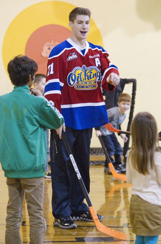 OILERS INK EWANYK &#8211; St. Albert minor hockey product Travis Ewanyk signed a three-year NHL entry level contract with the Edmonton Oilers on Friday. The Oilers drafted