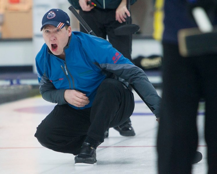 ICE CHATTER &#8211; Darcy Hafso yells instructions to his teamates in the President&#8217;s Cup A-B men&#8217;s final Tuesday against Craig King at the St. Albert Curling