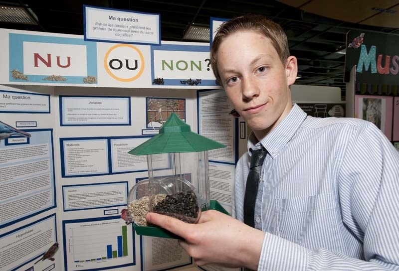 SEED SCIENCE – Jonathan Farr explains his award-winning entry at the Edmonton Regional Science Fair at NAIT last Saturday. Farr