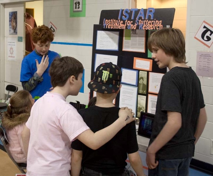 SHARING INFO – Pearse Schoenberger (right) and Thomas Gibson (left