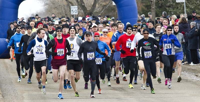 START TIME &#8211; Runners break out of the starting area at the 28th annual St. Albert 10-Mile Road Race on Sunday morning. A total of 385 runners went the distance. The
