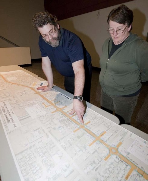 ROUNDABOUT AHEAD — Trevor Meister points out a detail on the proposed functional planning study for Hwy. 642 to Alberta MacAulay at an open house last Thursday at