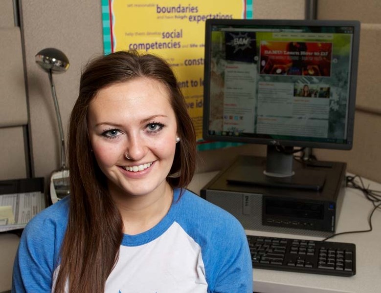 NEW SITE – Student Haley Josey of BAM (Building Assets and Memories) checks out a new website launched by the group this week to help draw local students together to plan