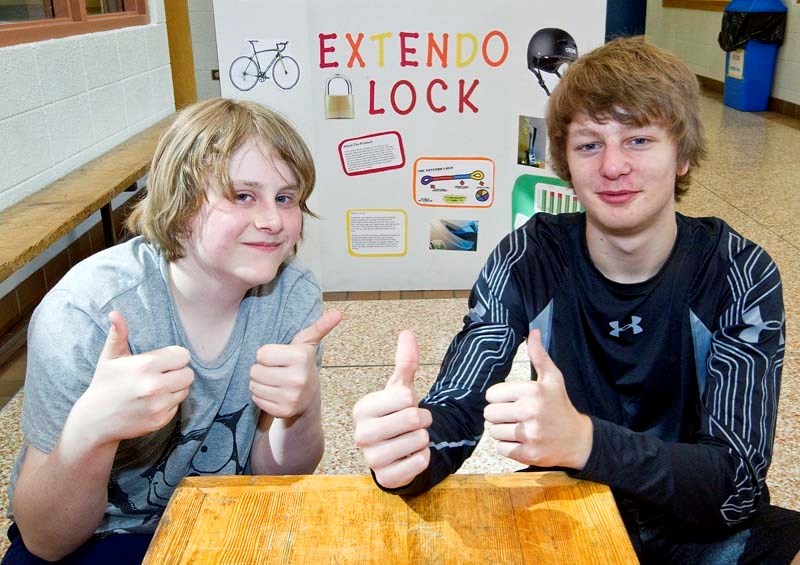 LOCKSMITHS – Vincent J. Maloney students Lane McMartin (left) and Garett Range showcased their extended bike lock invention at the Invention Convention in Edmonton on