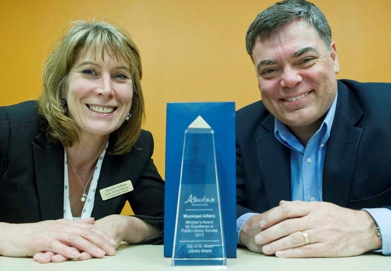 TOP AWARD – St. Albert Library Public Services Manager Heather Dolman and Library Director Peter Bailey pose with the recent Minister&#8217;s Award for Excellence and