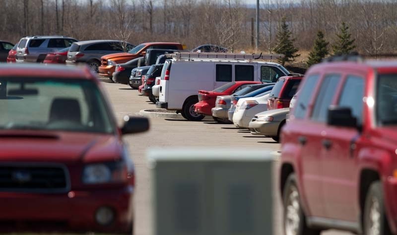PRICE OF SUCCESS – A busy parking lot at the new Holes location. Limited parking space available in the area.