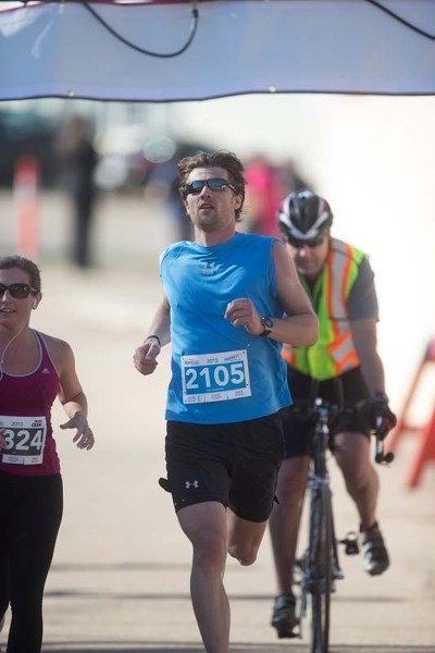 REPEAT WINNER &#8211; Robert Brunelle of Edmonton repeated as the Leading Edge RunWild half-marathon winner at 1:22:02 on Sunday morning. His winning time last year was