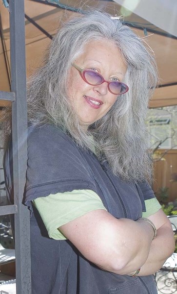 DETERMINED HOST – Local poet Christine Babiak is one of the organizers of High Energy: A Night of Spoken Word and Music
