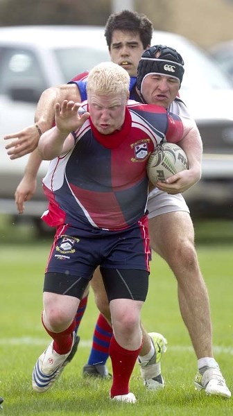 DRIVING FORWARD &#8211; Christian Otto drags a defender towards the try line
