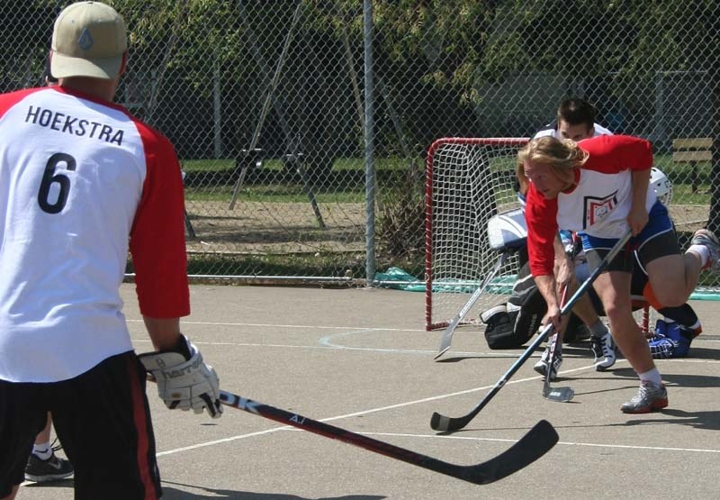 HOCKEY IN MEMORY – Friends of Landon Burt gathered at the Akinsdale tennis courts to play a ball hockey tournament in honour of the St. Albert man who died four years ago