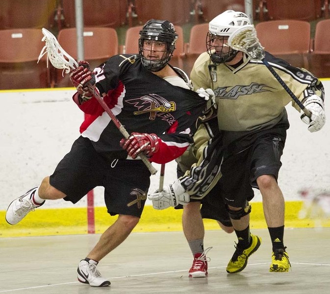 WATCH THE THREADS – St. Albert Miners player Ted White and Spruce Grove Slash player Paul Koch mix it up in a chippy Rocky Mountain Lacrosse League game Wednesday at Servus