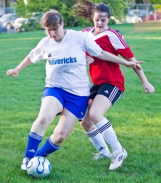 BODY BLOCK – Sam Kinniburgh of the Mavericks 09 soccer club block out the Morinville Storm in the division one opener on Tuesday evening.
