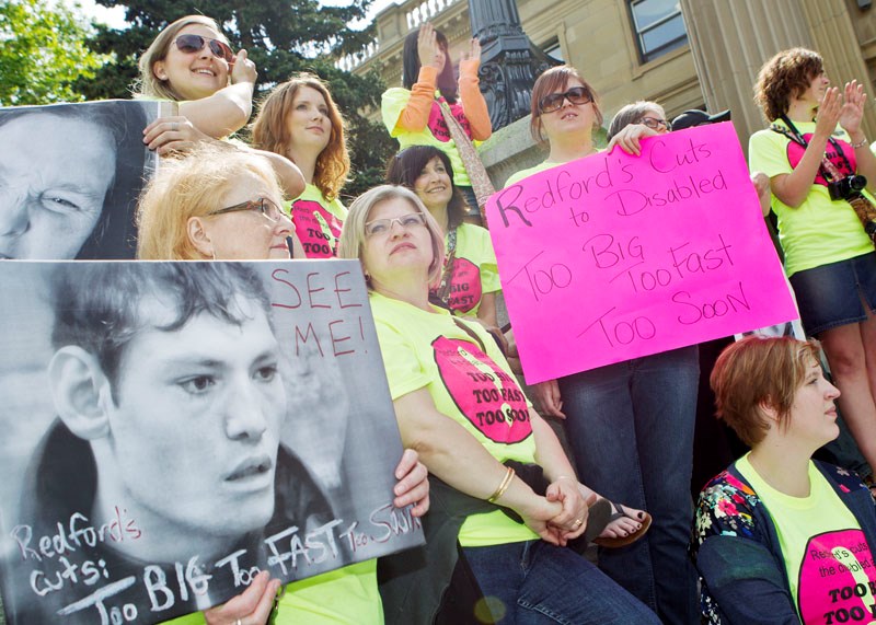 OUT IN FORCE – Organizers and clients of St. Albert-based Lo-Se-Ca joined hundreds of others at the Alberta Legislature Friday to protest government plans to chop $42 million 