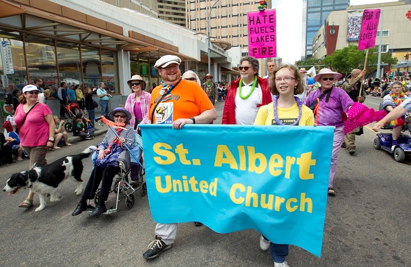 PRIDE ON DISPLAY – Supporters from the St. Albert United Church march in the Edmonton Pride Parade in June 2012.