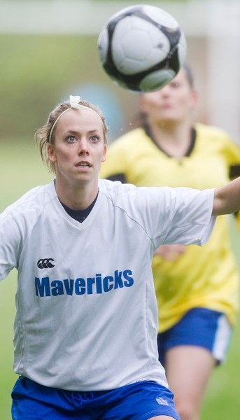 FLYING OBJECT &#8211; Mel Johannesen of Mavericks 09 prepares to head the ball in front of Angie Laboucan of the Morinville Ladies in Sunday&#8217;s division one match in the 