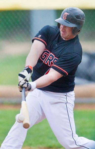 BATTER UP &#8211; Jason Fraser of the St. Albert Tigers makes contact at the plate against the Fort Saskatchewan A&#8217;s in Sunburst Baseball League action Friday at Legion 