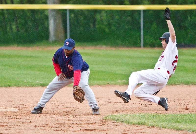 STEAL ATTEMPT &#8211; Kevin Maloney of the St. Albert Senior Cardinals attempts to beat the tag at second base in Monday&#8217;s 10-3 win over the Edmonton Blues at Legion