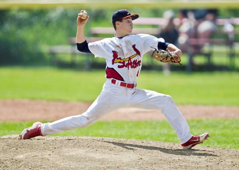 HERE&#8217;S THE PITCH – Tyler Mecir launches a pitch as the St. Albert midget AAA Cardinals take on the Calgary Dinos on Saturday. The locals dropped both games in their
