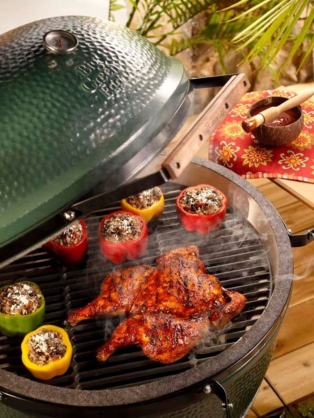 EGG COOKER – The Big Green Egg is a versatile outdoor cooker that can smoke and grill.