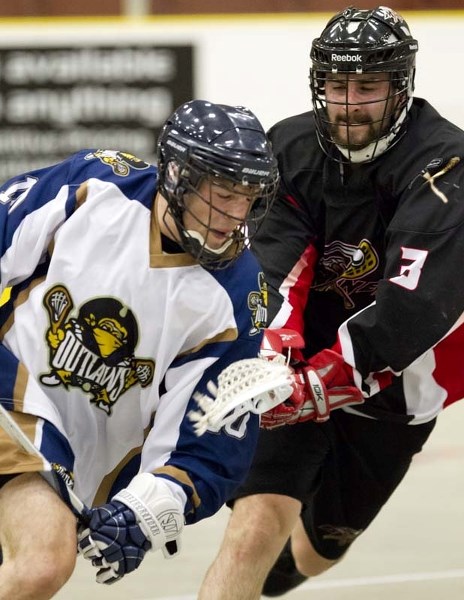 FINDING A WAY – St. Albert senior B Miner Chad Gendall gives chase against the Edmonton Outlaws at Servus Place Wednesday evening.