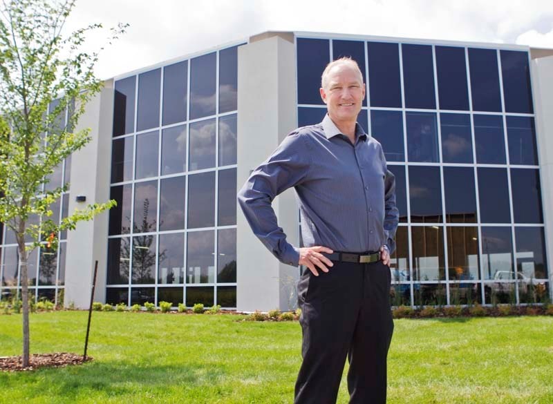 NEW HOME – Johnston Builders owner Don Johnston stands outside his company&#8217;s new building on Carnegie Drive.