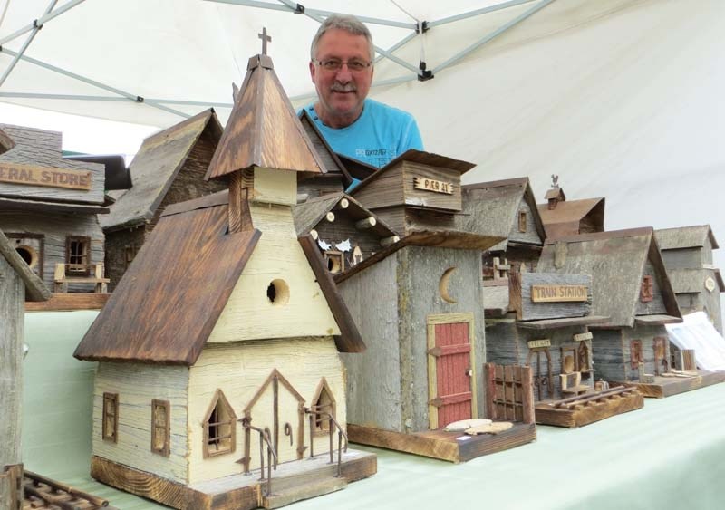 BIRD ABODES – Larry Treichel designs and builds more than 200 one-of-a-kind birdhouses every year.
