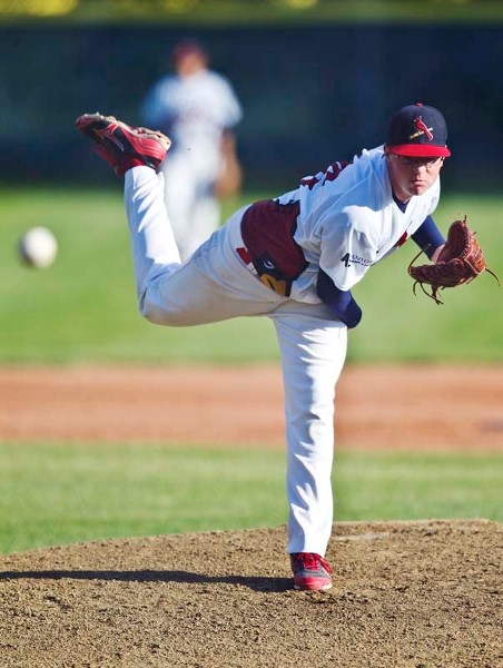 WINNING STYLE – Midget AAA Cardinals pitcher Alex Marthiensen throws down the middle during a game against the Sherwood Park Athletics at Legion Memorial Park on Wednesday.