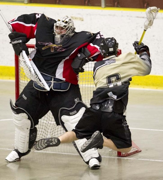 MINDING THE TWINE – St. Albert senior B Miners goalie David Marrese reacts to a shot by a Spruce Grove Slash player Saturday evening at Servus Credit Union Place. The Miners