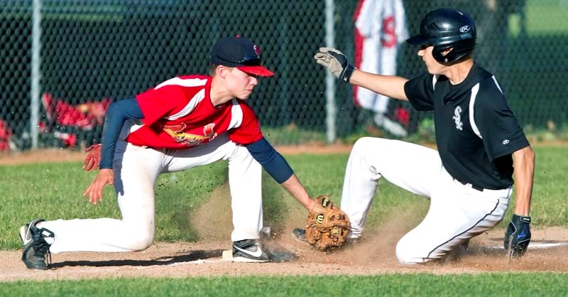 OUT AT THREE – Third baseman Anthony Owen makes the out for the St. Albert bantam AAA Cardinals in an 16-4 loss to the Spruce Grove Sox Wedenesday evening.
