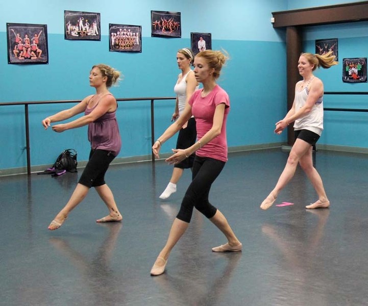 DANCE WORKOUT – Members of the ballet bootcamp class at St. Albert&#8217;s DanceCo Ltd. get a workout inspired by traditional ballet moves.