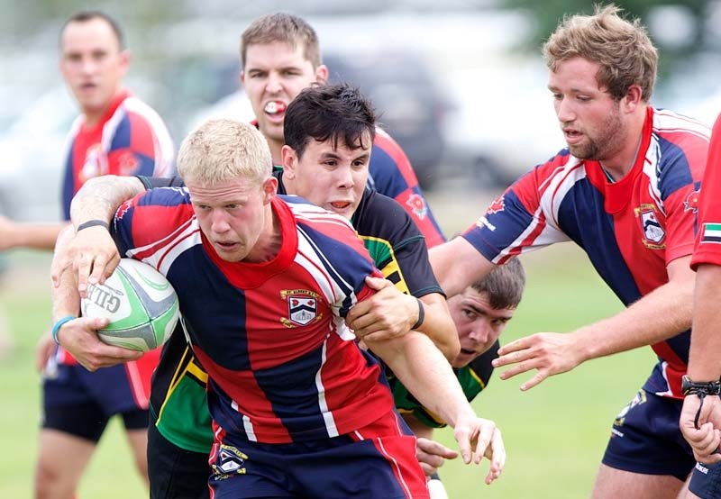 BREAKING FREE &#8211; Travis Brenneis of St. Albert pulls away from an opponent&#8217;s grip in Saturday&#8217;s second division scrimmage against the Lep/Tigers at Ellerslie 