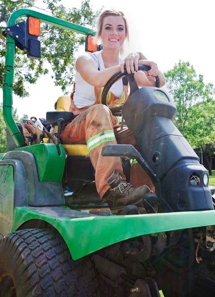 GENDER SHIFT – Erin Blake is a member of the city&#8217;s summer turf crew. This year