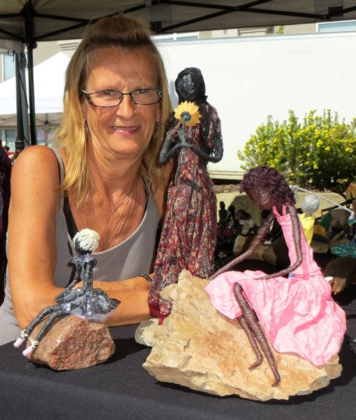 WHAT A DOLL – This week Market Place takes you to visit Karen Moir&#8217;s simple booth filled with three tables of these tiny magical dolls.