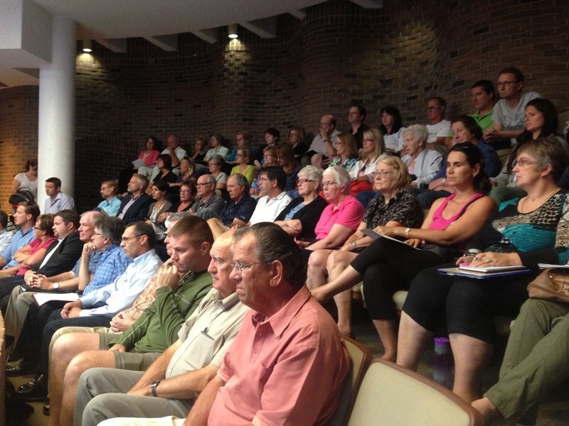 SCHOOL CONCERN – Dozens of local residents attended city council Aug. 19 to voice concern about a proposed school.