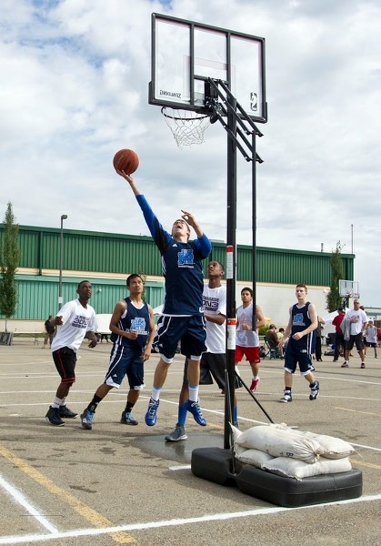 SCHOOL SPIRIT &#8211; The Paul Kane Blues were hooping it up at the J.R. Patrick Classic 3-on-3 Basketball Tournament outside Servus Credit Union Place last weekend.