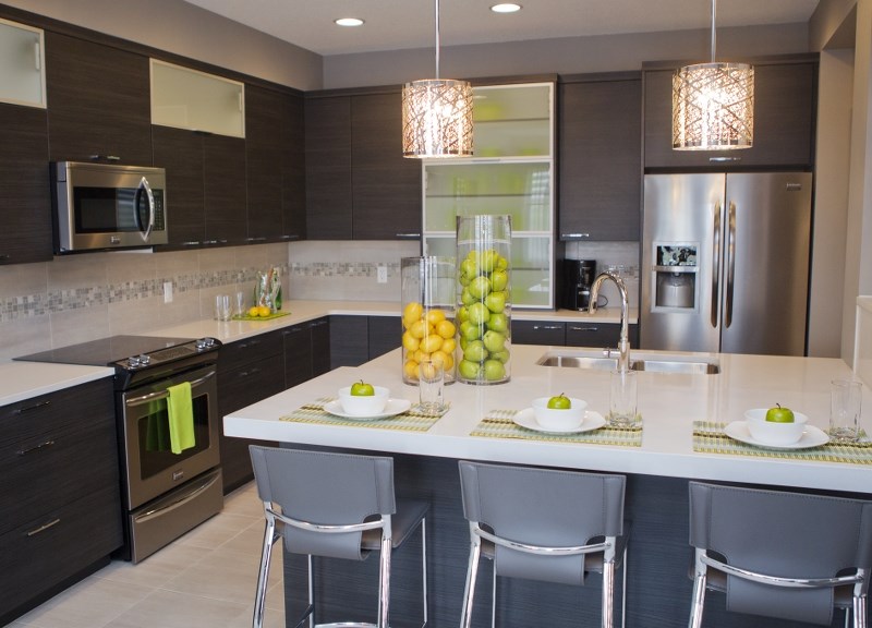 Thermofoil cabinets are the focal point in Vista Homes&#8217; sleek and modern kitchen in Northridge.