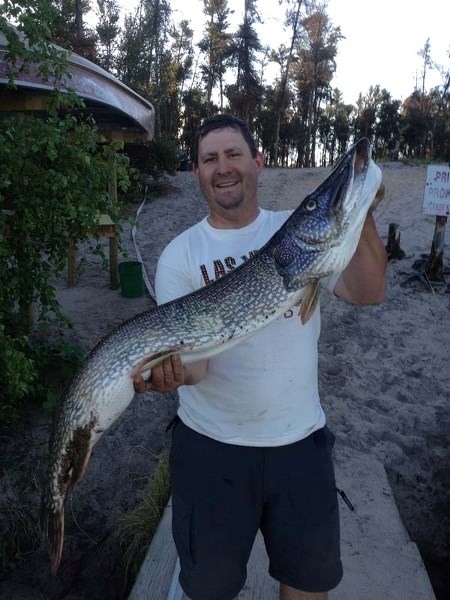 BIG FISH &#8211; Tyler Uzelman shows off the 47.5-inch