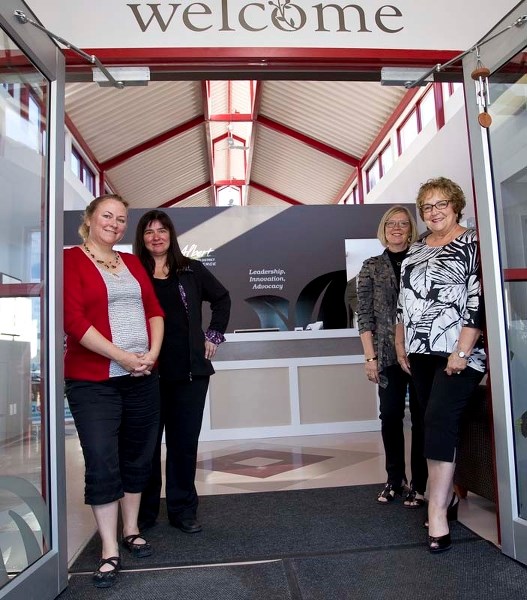 CHAMBER HEADQUARTERS – St. Albert and District Chamber of Commerce staff show off their newly-renovated office on St. Albert Trail. Pictured are (L-R): Shawn Runcer