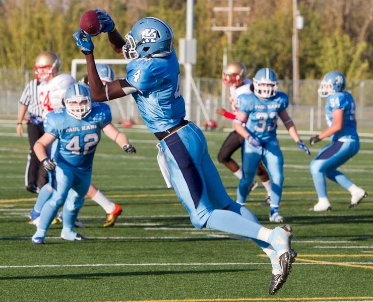 BALL HAWK &#8211; Shaydon Phillip grabs a touchdown pass for the Paul Kane Blues against the Strathcona Lords in the second quarter in Thursday&#8217;s high school football