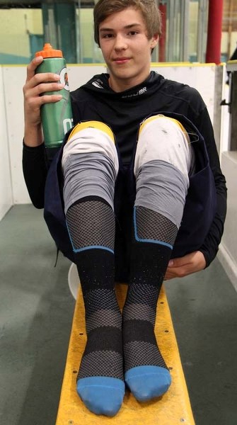 SAFETY SOCKS – Bantam player Justin Roy