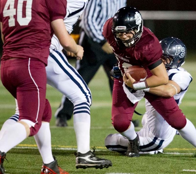 DOGGED DETERMINATION &#8211; Bellerose Bulldogs&#8217; quarterback Matty Short battles for extra yards in last week&#8217;s 49-7 drubbing of the winless Ross Sheppard