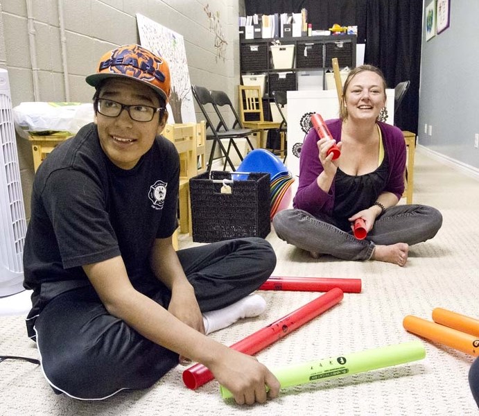 GOOD TIMES – Tharren Gillespie gets some help from Sheila Chisholm as he participates in a program for kids with FASD.