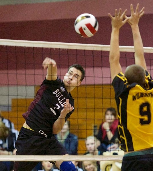 BALL SPIKER &#8211; Sean Poulin of the Bellerose Bulldogs pounds the ball against the Bawlf Wildcats in Thursday&#8217;s pool B match at the 19th annual Lions Western