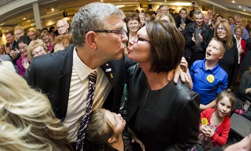 SEALED WITH A KISS – Nolan Crouse gets a kiss from his wife Gwen Monday night after learning that he&#8217;d earned a third term as mayor of St. Albert.